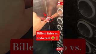 Billete falso vs. dedo real 😅🚪