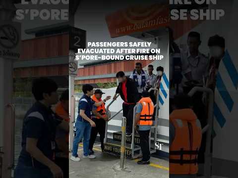 Passengers evacuate after fire on cruise ship en route to Singapore