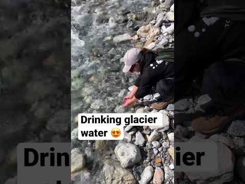 Drinking glacier water from the stream in BC Canad 