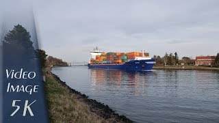 Rendsburg, Germany: Kiel Canal (Nord-Ostee-Kanal), Container Ship "EMPIRE" - 5K UHD Video (2880p)