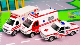 Rescuers in action: an ambulance, a Police car and a bus in the city
