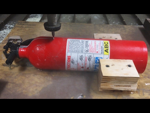 Fire Extinguisher cut in half with A 60,000 PSI Waterjet Cutter - Interesting Cross Section