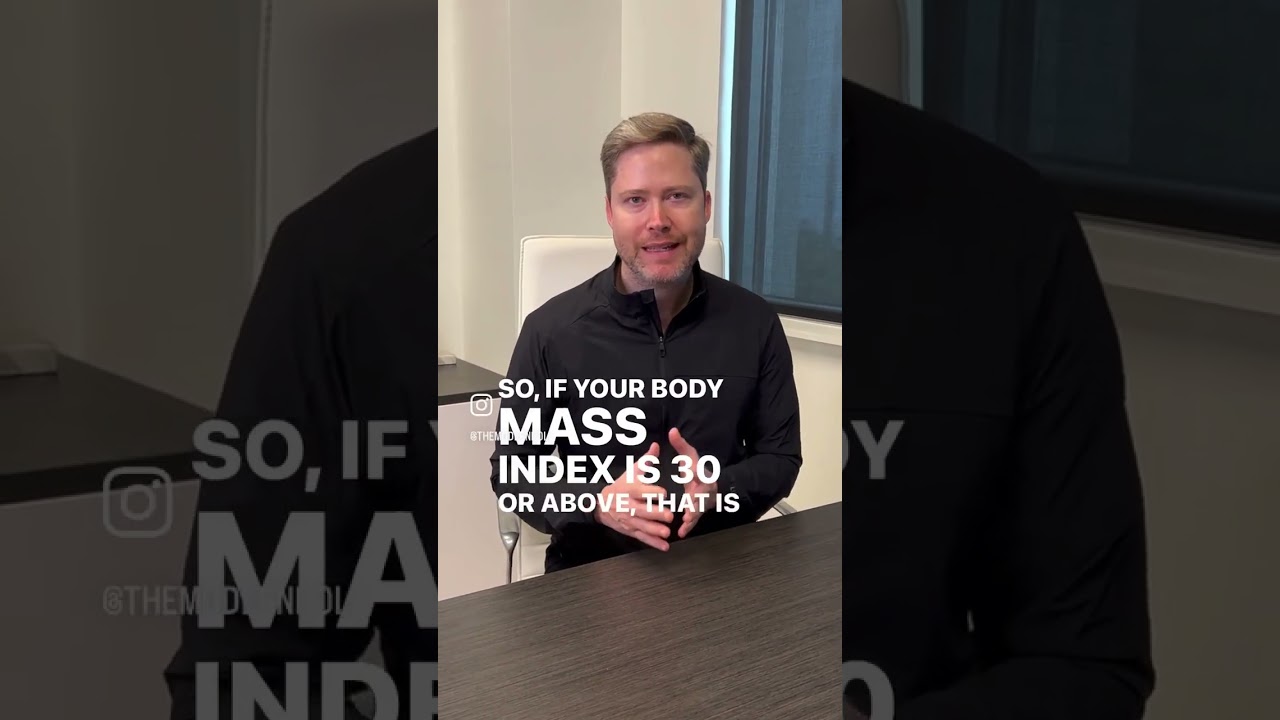 Man discussing body mass index information.