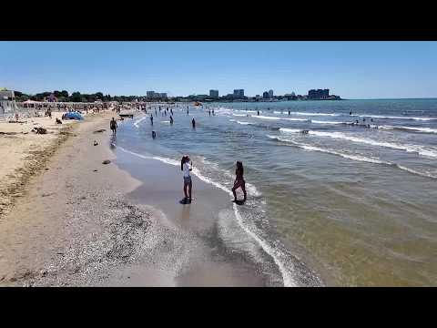 Even at the beach, it's hard for Russians to escape the war