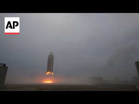 Japan space agency's experimental reusable rocket hovers and lands safely in first test flight