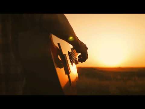 Playing Guitar In The Sunset