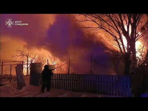 Houses on fire after overnight strike in Ukraine's Sumy region | AFP