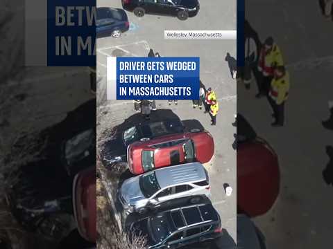 Driver gets wedged between cars #skynews #us #massachusetts