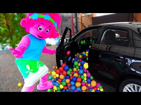 Max and Nikita playing with Cars and balls