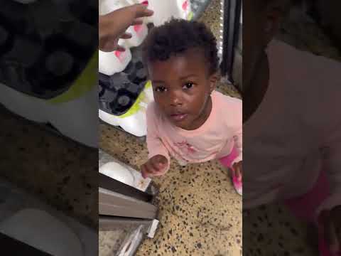 Toddler Sneaks Into Milk Fridge While Mom's Back is Turned