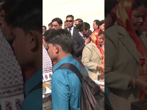 C M Bhajanlal Sharma distributed food to devotees at the Rajasthan Mandap in Prayagraj, UP