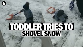 Kid Shovels Snow With His Father!