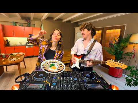 We play chill house music & cook sushi in Amsterdam