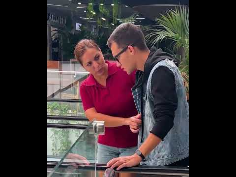 The good lady saves the guy who is afraid to go down the escalator #shorts #short #kindness
