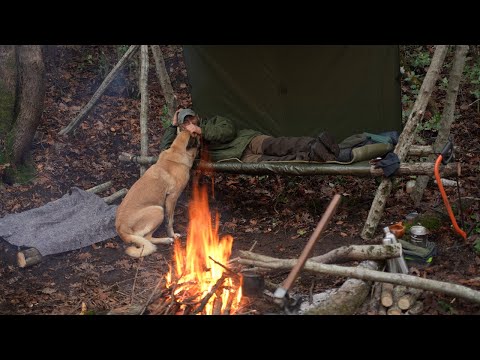 Wildcamping in the wild nature high on the mountains,Surviving in the open in a biviback in the cold