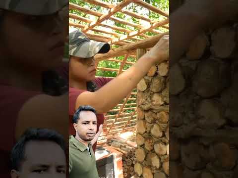 কাঠ এবং মাটি দিয়ে বাড়ির শক্ত দেয়াল তৈরি করা হচ্ছে। #house #home #wall #wood #youtubeshorts