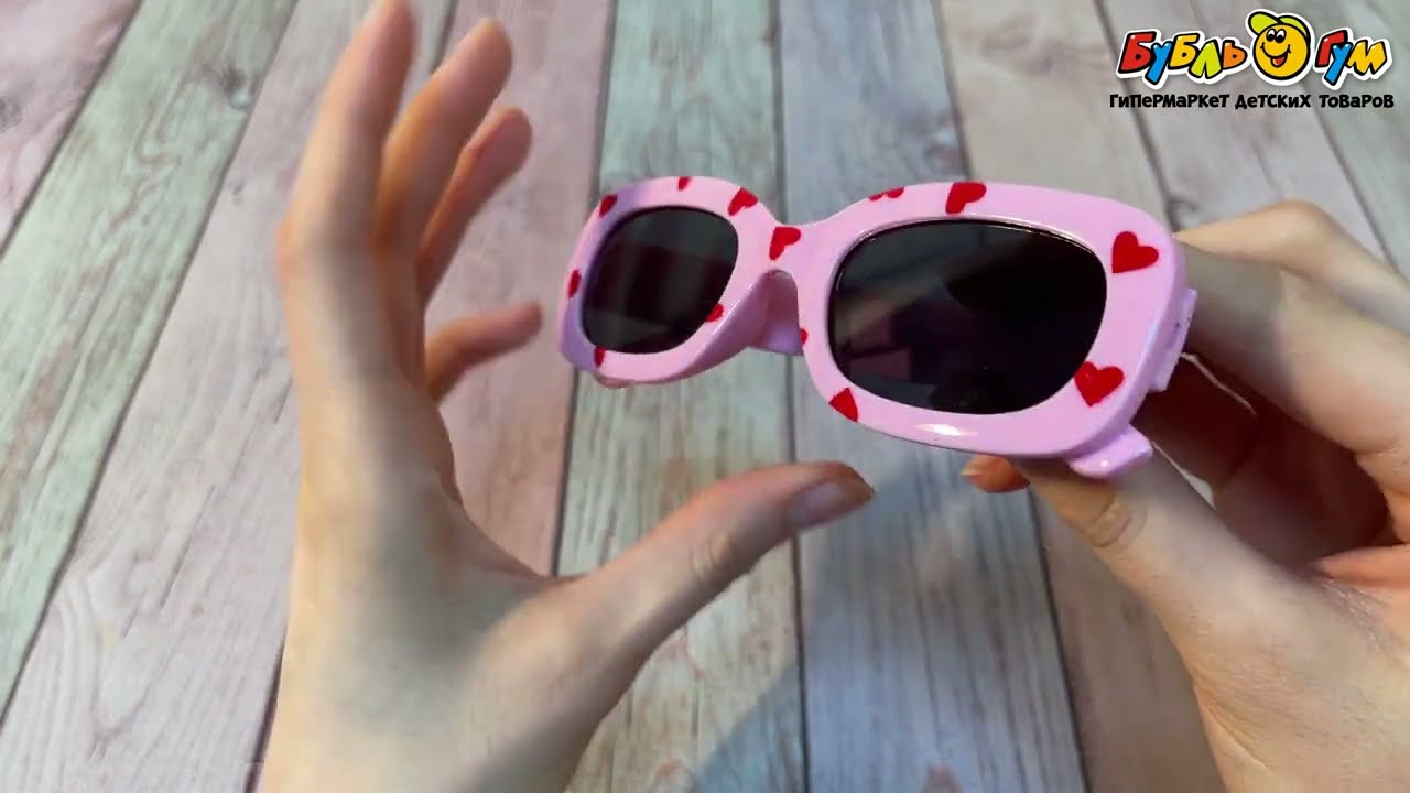 Очки солнцезащитные Lanson Kids с сердечками розовые - видео Очки солнцезащитные Lanson Kids с сердечками розовые - видео