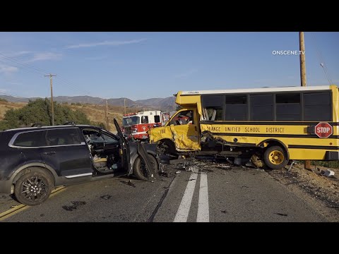 5 Injured in SUV Hits School Bus Head On