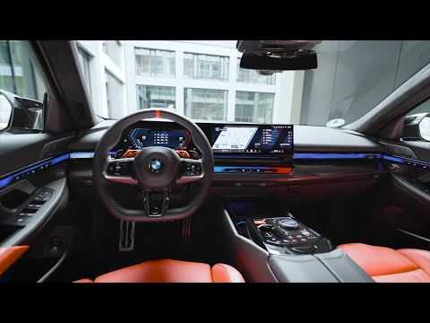 The all-new BMW M5 Touring Interior Design in Fire Red