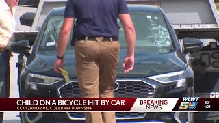 Child on a bicycle hit by car