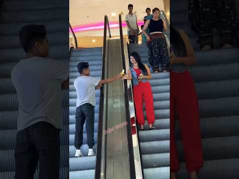 Kela 🍌 prank video on the escalator 🤪epic reaction 😬. #prank #shortsfeed #shorts #escalator