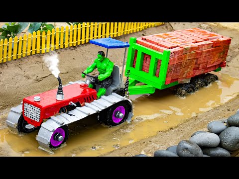 top most creative diy tractor video | mini tractor is pulling a trolley full of BRICKS stuck in mud