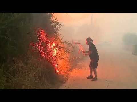 YouTube video thumbnail: Wildfire Burns Homes and Forces Evacuations Near Patras, Greece