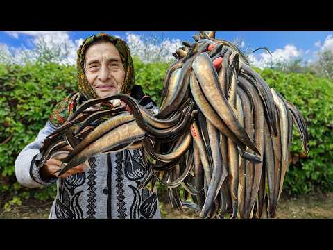 Grandma Cooking River Eel on the Barbecue - Eel Between Bread