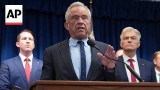YouTube video thumbnail: Authorities Announce Charges Against 15 People Accused of Fraud in Minnesota