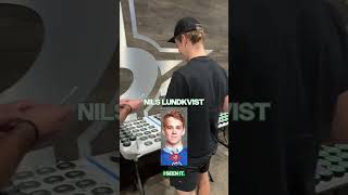 Asking Dallas Stars players to sign old photos of themselves