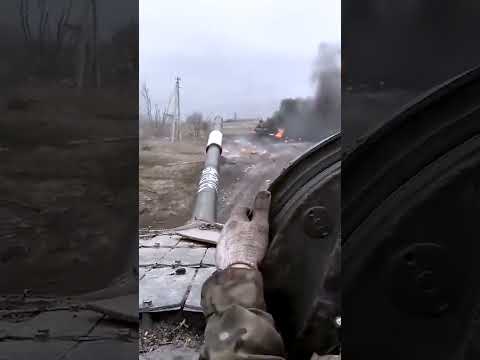 Russian soldiers flee after their T-80 tank is hit by Javelin missile