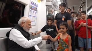 A ride to remember! PM Modi casually takes the metro to SRCC, interacts on the way…