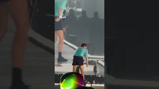Harry Styles collapses on stage after 'choking' on water