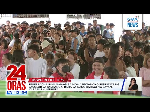 Relief packs, ipinamahagi sa mga apektadong residente ng Bacolor sa Pampanga; baha sa ilang bahagi ng bayan, 'di pa rin humuhupa 