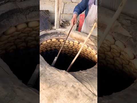 baking in giant mud oven 🥯 #shorts #india #baking #food #usa #jakarta #indonesia #japan #us #canada