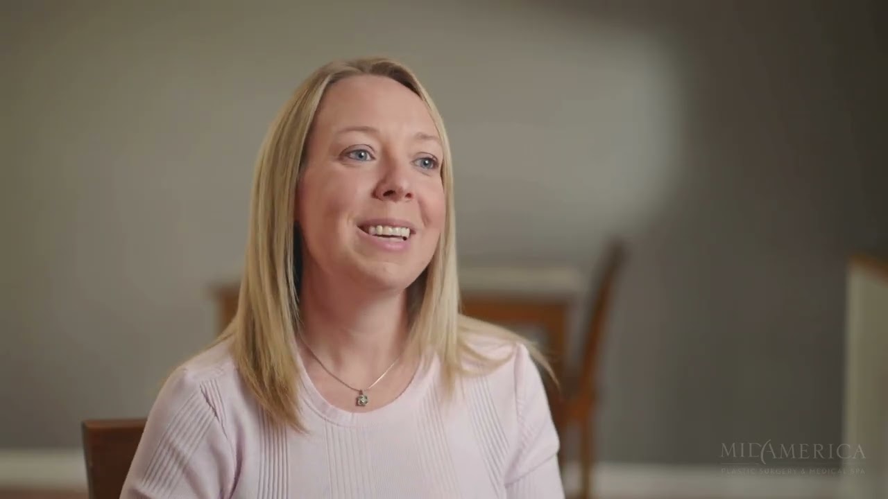 Woman sitting in a cozy living room.