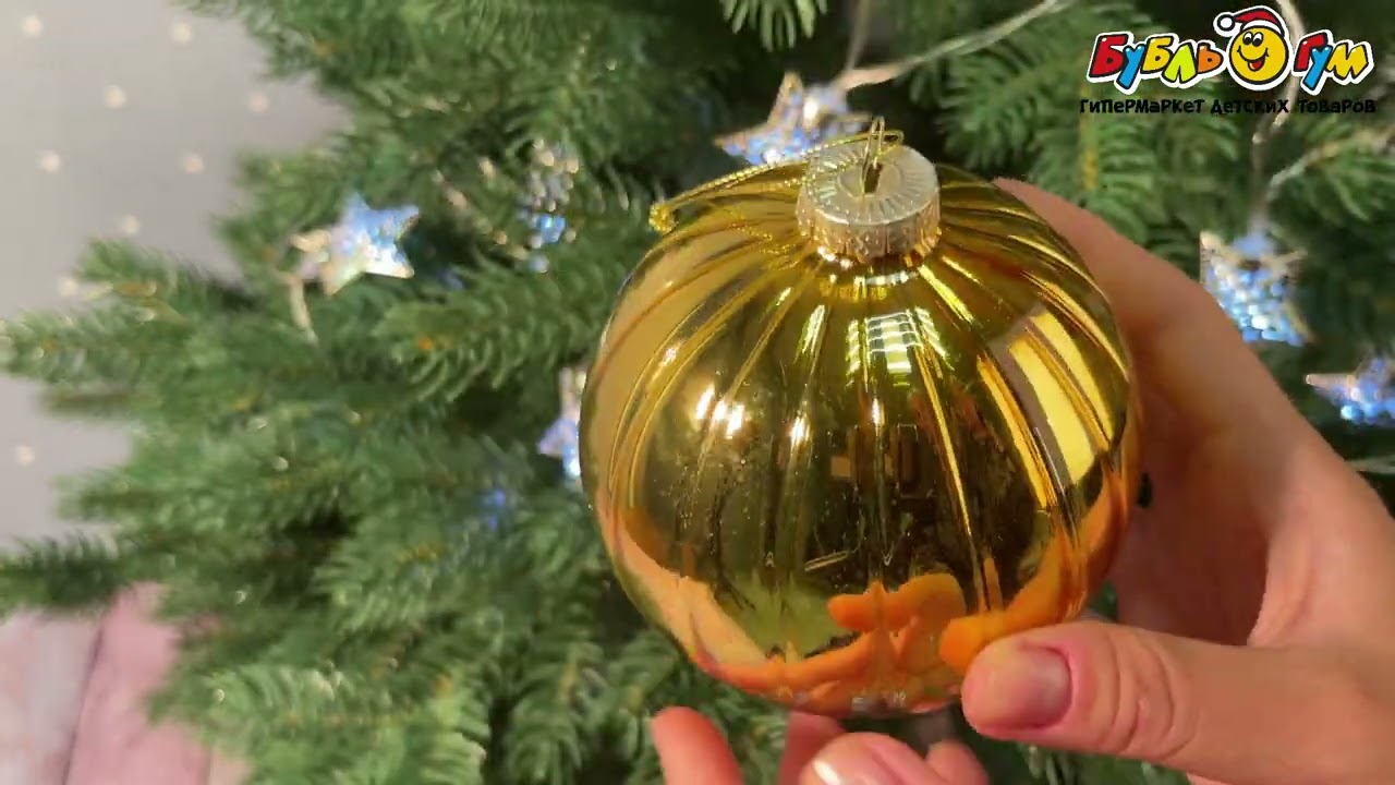 Елочное украшение шар глянцевый с гранями золотого цвета 10см - видео