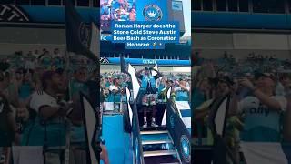 Former Panthers safety Roman Harper does Stone Cold Steve Austin Beer Bash at Charlotte FC match.