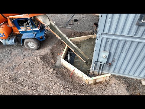 Pouring concrete slabs and fixing an excavator