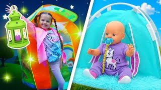 Maya is going on a sleepover picnic! Kids play water toys & family games with Lina the baby doll.