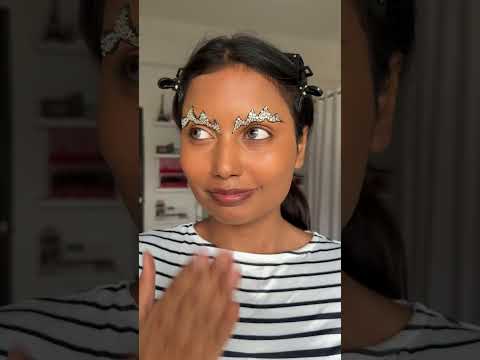 Angry rhinestone brows makeup look