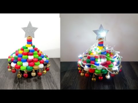 arbol de navidad hecho de tapas plasticas recicladas hacer arbolito de navidad de material reciclado