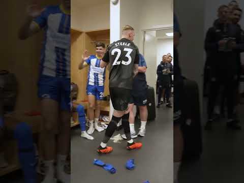 Brighton Players Celebrate In Dressing Room After Arsenal Win