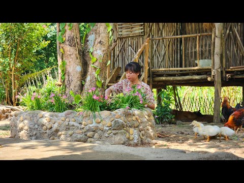 Renovating the garden: Build flower beds and natural stone edging. Plant a beautiful flower bed