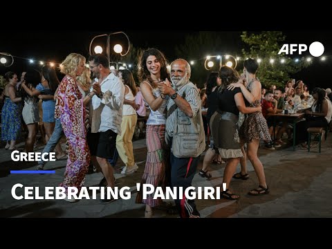 Locals and tourists dance the night away at Greek village festival | AFP