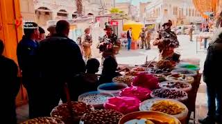 Israeli soldiers forcibly and violently close Palestinian shops in the Old City of Hebron