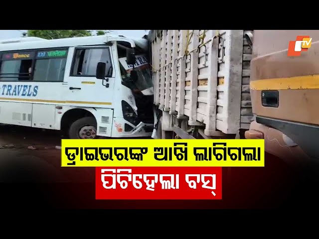 Bus crashes into broken-down truck on road