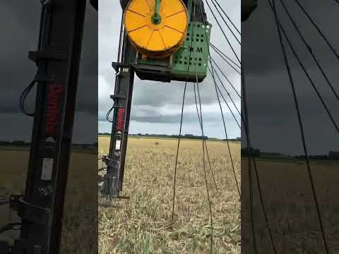 Pull Drip Tape Out Of Onion Fields — See How This Big Reel Machine Works