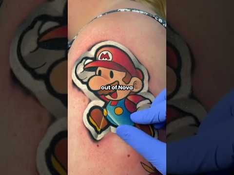 His tattoos look like stickers!