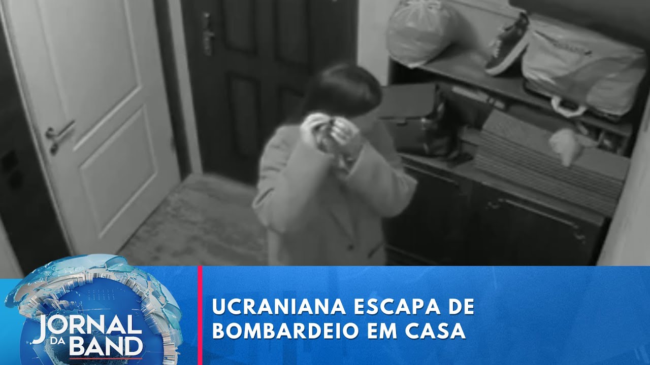 Ucraniana escapa de bombardeio em casa